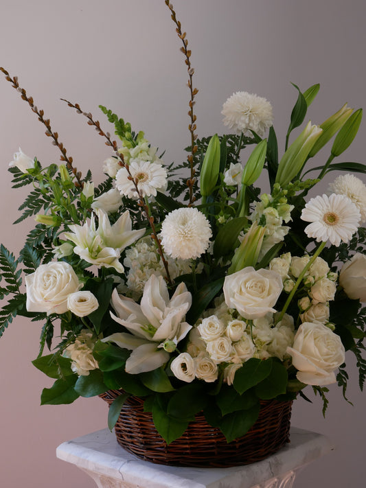 Funeral basket featuring lilies, hydrangeas, chrysanthemum, roses, greens, and more by Floral Esthetics - Cape Cod Local Florist