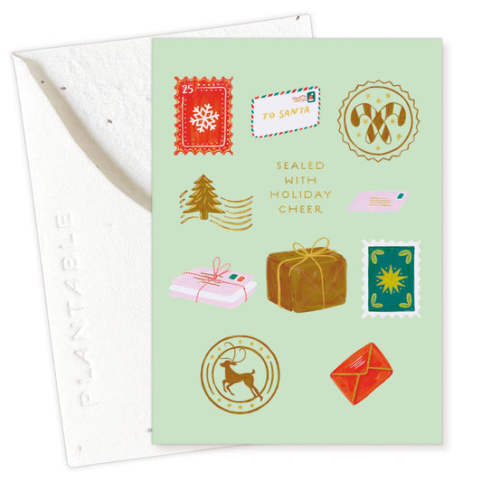 Christmas-themed card with illustrations of stamps and holiday icons on a light green background.