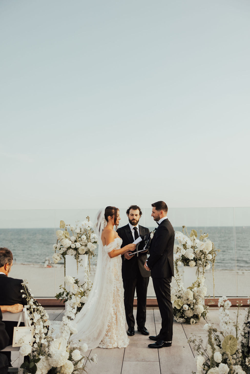 Cape Cod modern wedding ceremony featuring hydrangeas, amaranthus, orchids, delphinium, anthuriums, wild flowers, and more by Floral Esthetics at Wychmere Beach Club 