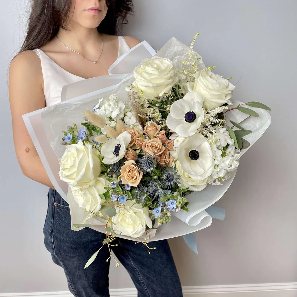 Premium size cape style wrapped bouquet featuring anemones, roses, spray roses, tweedia and other stuff by Floral Esthetics - Cape Cod Florist