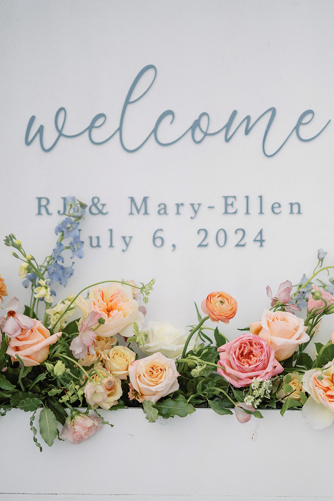 Colorful Cape Cod wedding welcome sign by Floral Esthetics