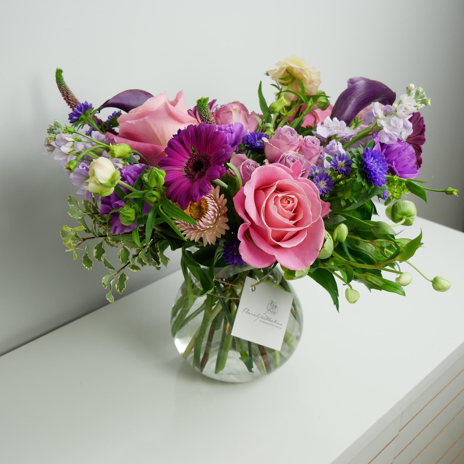 Example of premium size designer choice flower arrangement in clear vase
