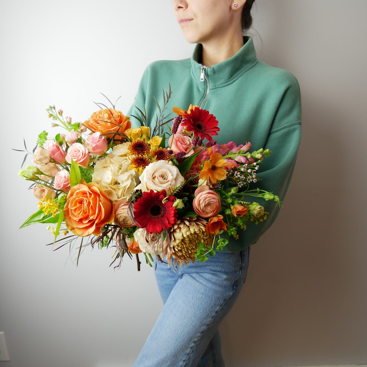 Standard size fall bouquet featuring spray roses, chrysanthemum, gerberas, hydrangeas, seasonal blooms and berries by Floral Esthetics