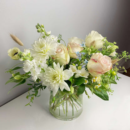 Premium size cape style flower arrangement in clear vase featuring dahlias, roses, twedia, wild greens and other stuff by Floral Esthetics in Marstons Mills