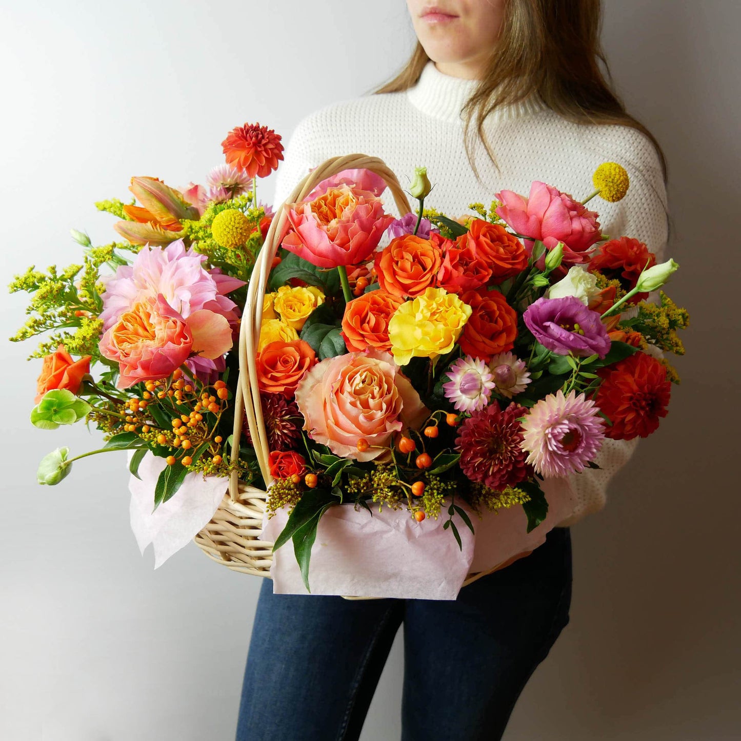 Colorful fall large flower basket featuring garden roses, spray roses, dahlias and more by Floral Esthetics